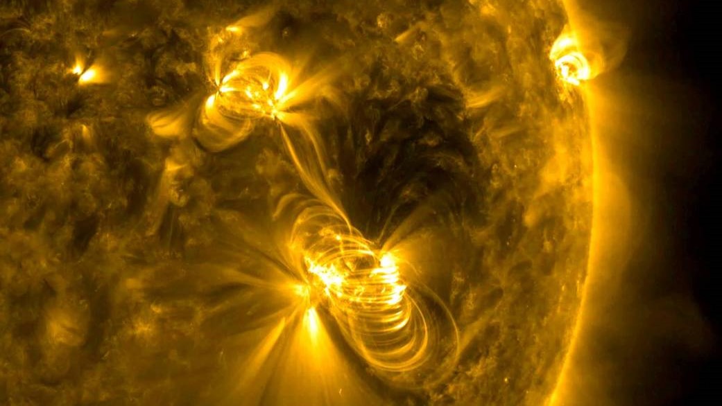 swirling ejections from sun coloured yellow