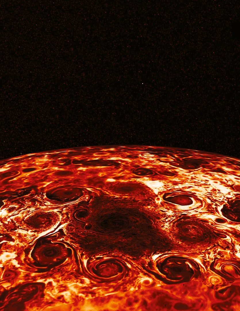Jupiter’s north pole is home to an enormous central cyclone encircled by eight smaller storms. Juno’s infrared imager shows the cold of the jovian poles: the yellow clouds are a chilly -13°c and the dark red a deep-frozen -181°c.