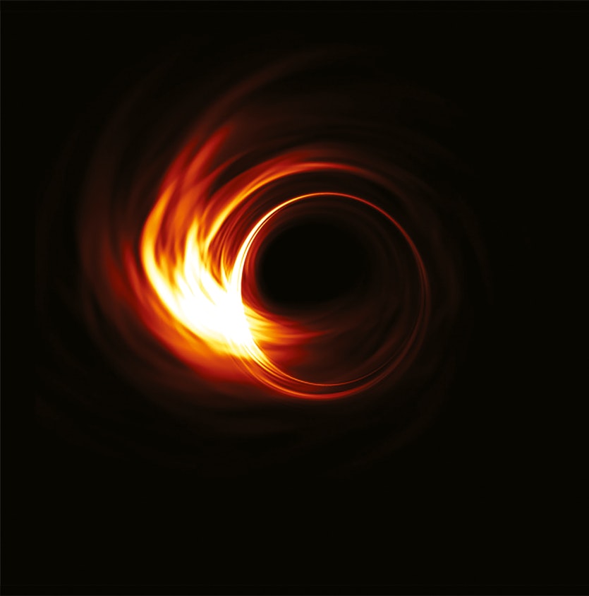 The accretion disc around a black hole might appear as a bright swirl around a circle of darkness, as shown in this simulated image.