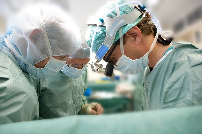 Surgeons performing open-heart surgery.