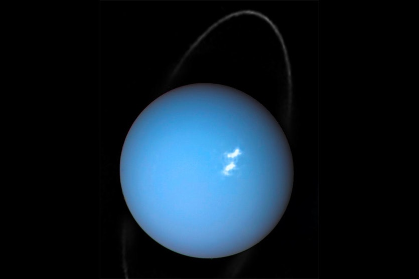 A composite image showing an extremely bright aurora on Uranus.