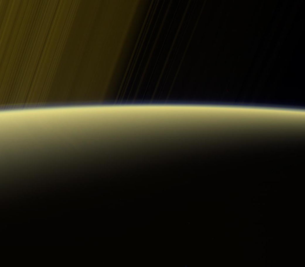 Looking over Saturn’s horizon to the rings.
