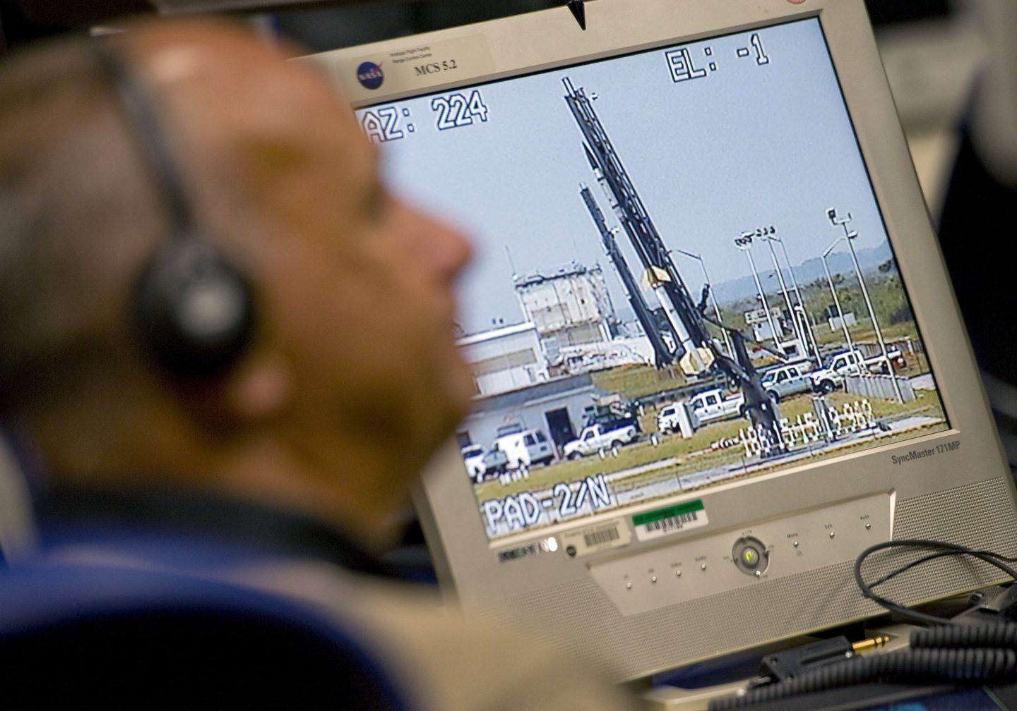 NASA staff monitor the launch of a sounding rocket.
