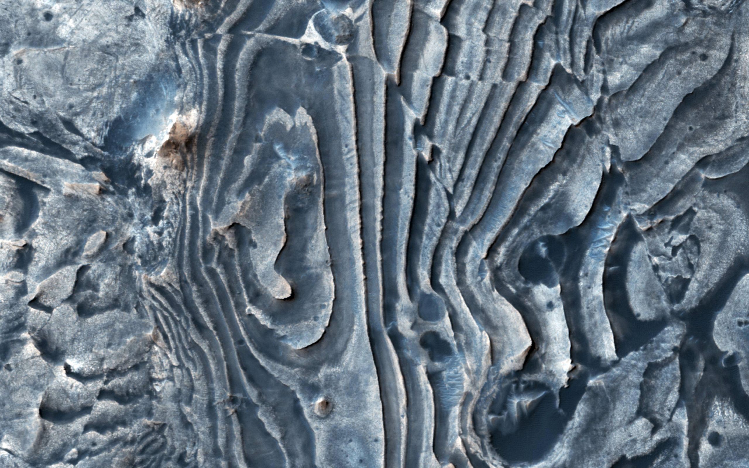 Faulted layers in the martian ground.