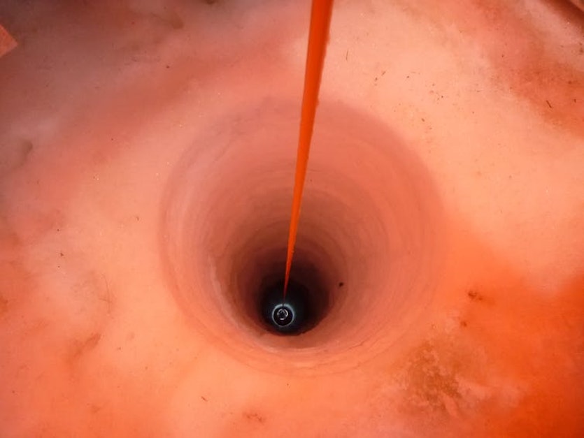 A team of ice drillers from Victoria University of Wellington used hot water and a drilling system developed at Victoria to melt a hole through hundreds of metres of ice.
