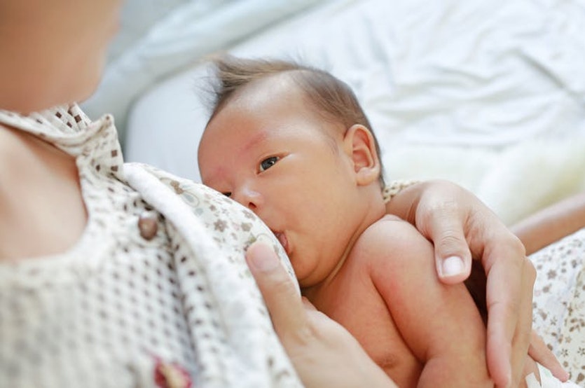 Genes that determine the amount and quality of breastmilk influence child development.