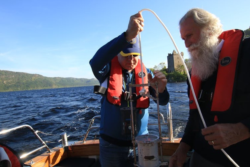 Loch Ness expert, Adrian Shine (right), had dredged the deep lake many times and is now helping to sample DNA traces of life.