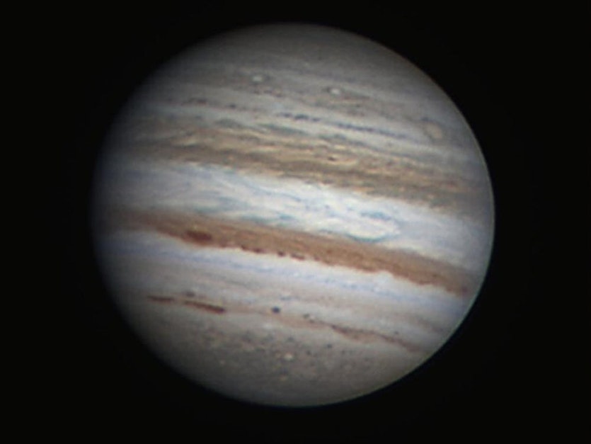 The bands of jupiter captured by an earth-based astronomer.