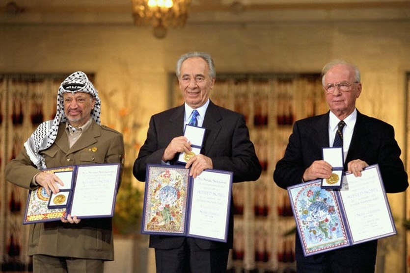 The 1994 Nobel Peace Prize was awarded to (from left to right) PLO Chairman Yasser Arafat, Foreign Minister Shimon Peres and Prime Minister Yitzhak Rabin. Many people were angry that the prize was awarded to Arafat.