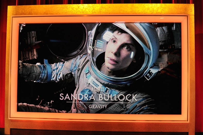 In the movie gravity, high-speed space junk destroys a shuttle carrying sandra bullock, george clooney and other cast members.
