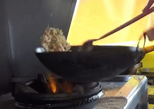 Highly skilled: wok-frying rice is much more complicated than it appears.