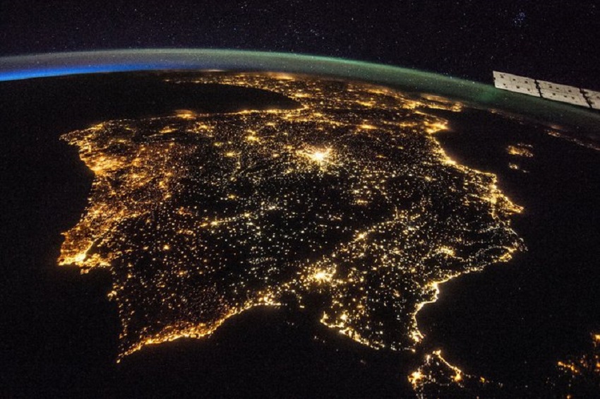 The bright city lights on the Iberian Peninsula.