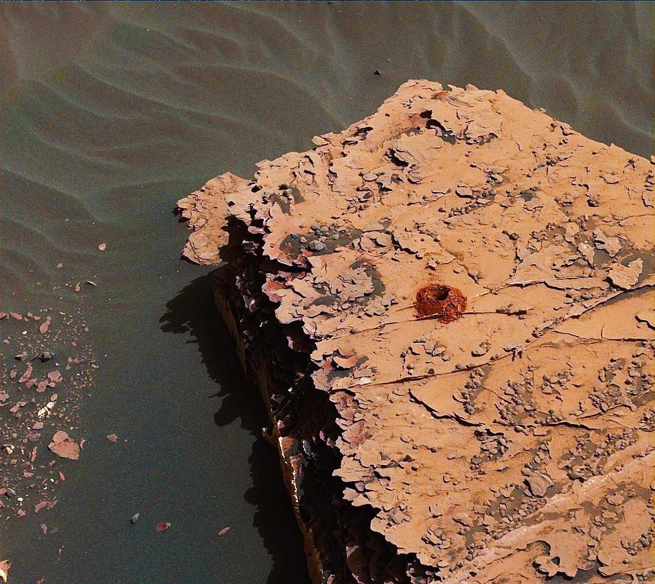 A small hole on Mars represent a big achievement for Curiosity’s engineers.