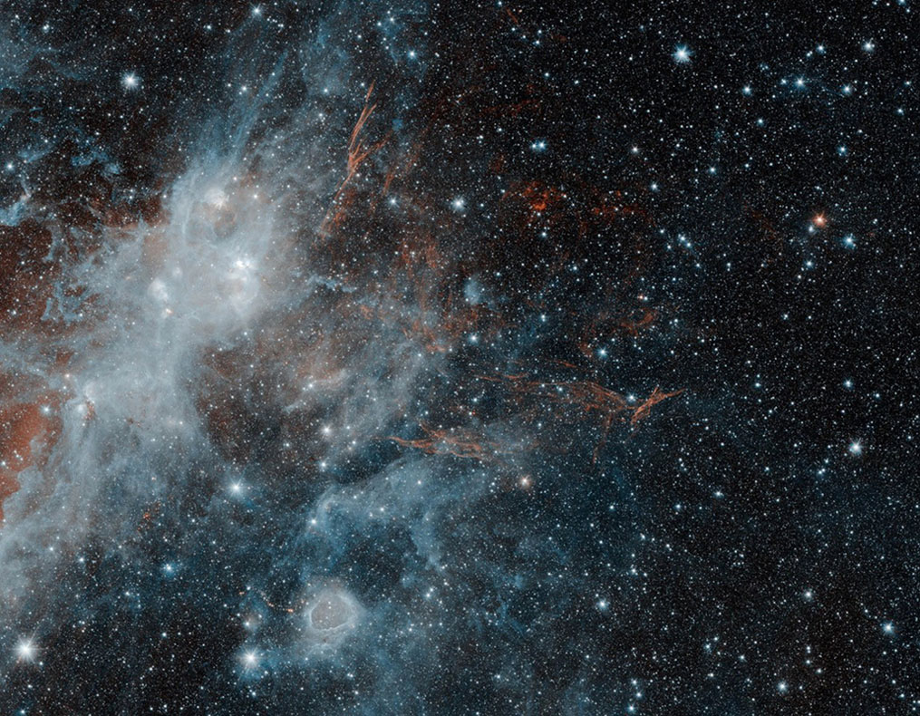 Faint red traces of the supernova remnant known as HBH 3 can be seen in this image.