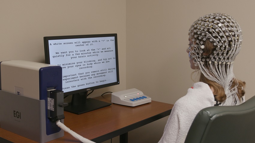A participant’s brain activity being monitored as part of the trial.