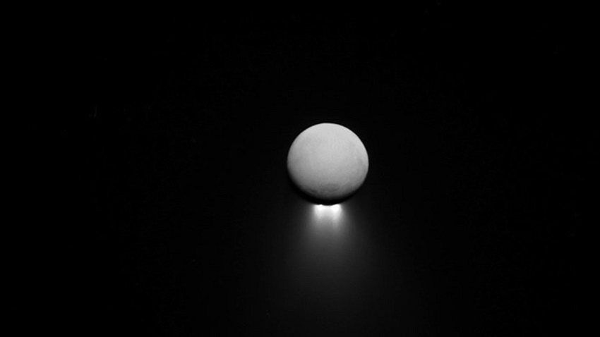 Saturn’s moon Enceladus with the Sun behind it. Are there oceans in the picture as well?
