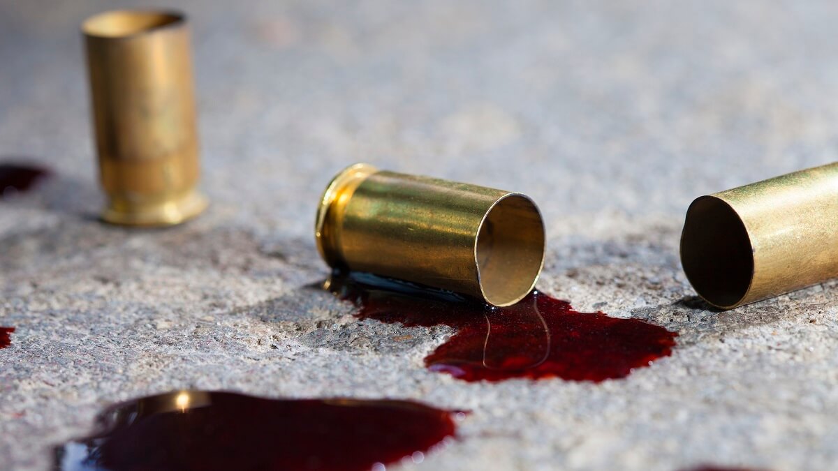Bullets and blood from a crime scene. Fluid physics analysis of blood can reveal forensic information about crime scenes.