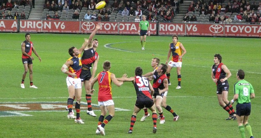 An AFL match between Essendon and Adelaide Football Clubs. Essendon trialed the Nexus A9 mouth guards in 2019.