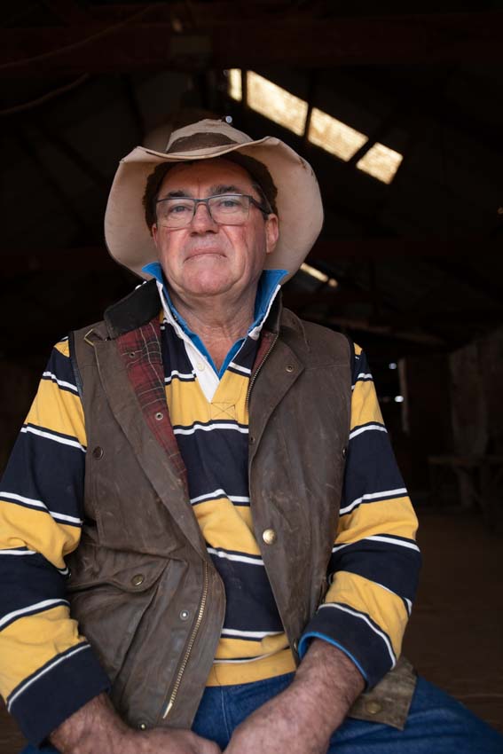 Nilpena station owner ross fargher sitting on a chair in the old woolshed.