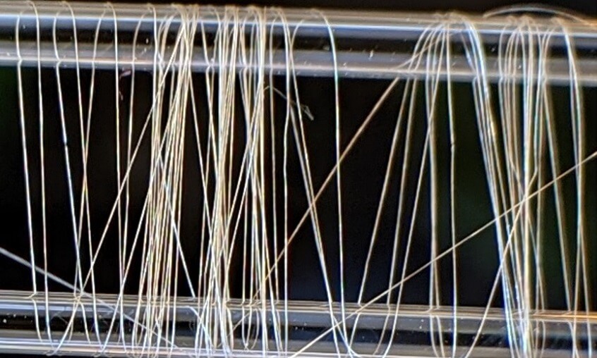 lots of fibres between two rods