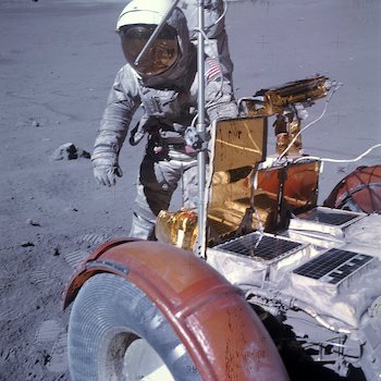 Charlie duke circles the front of the rover