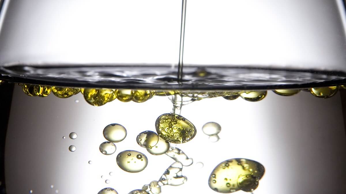 Yellow Oil blobs in water