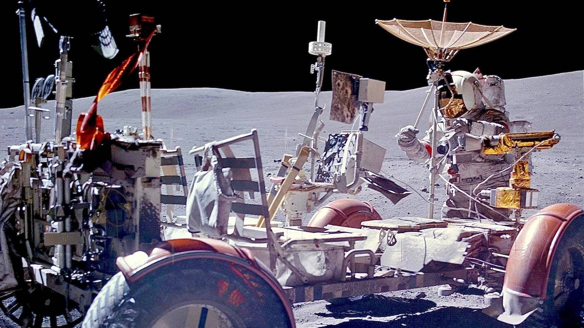 Photograph of John Young and the lunar rover on the Moon