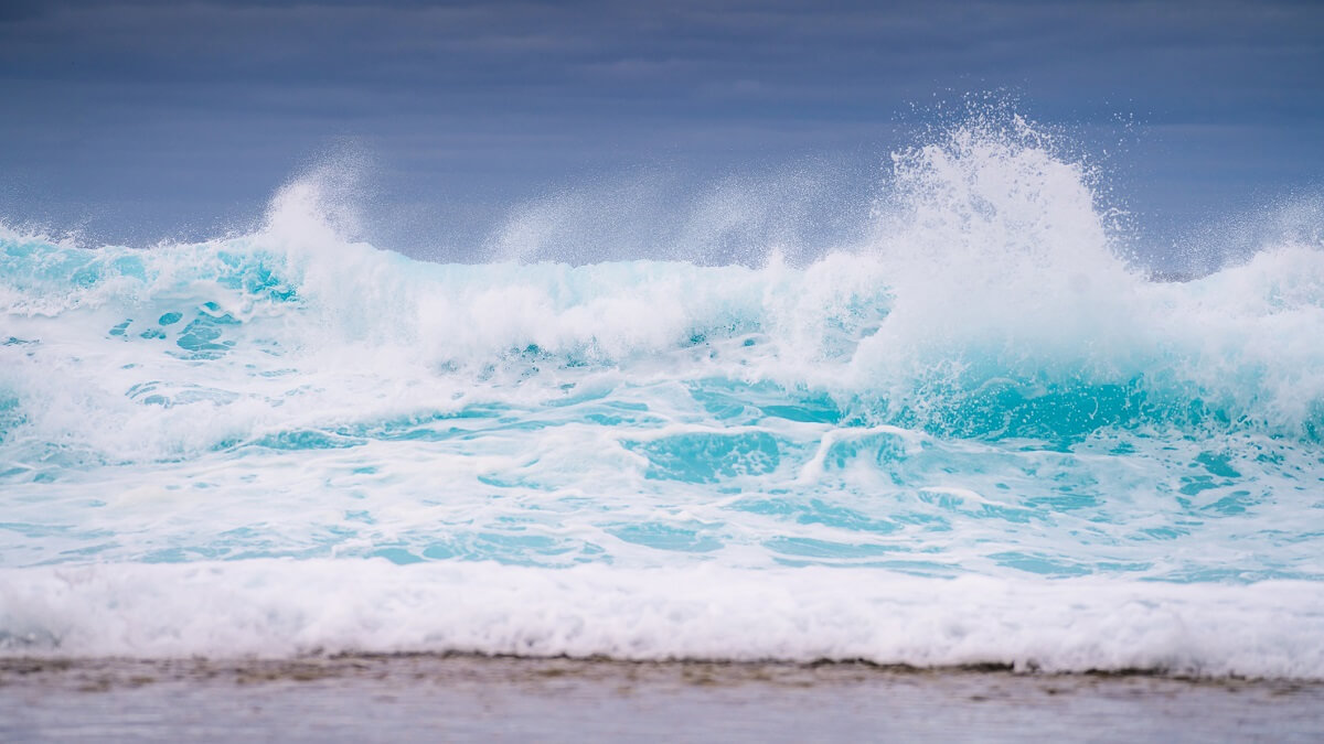 Waves on a beach ahead of a storm in Western Australia