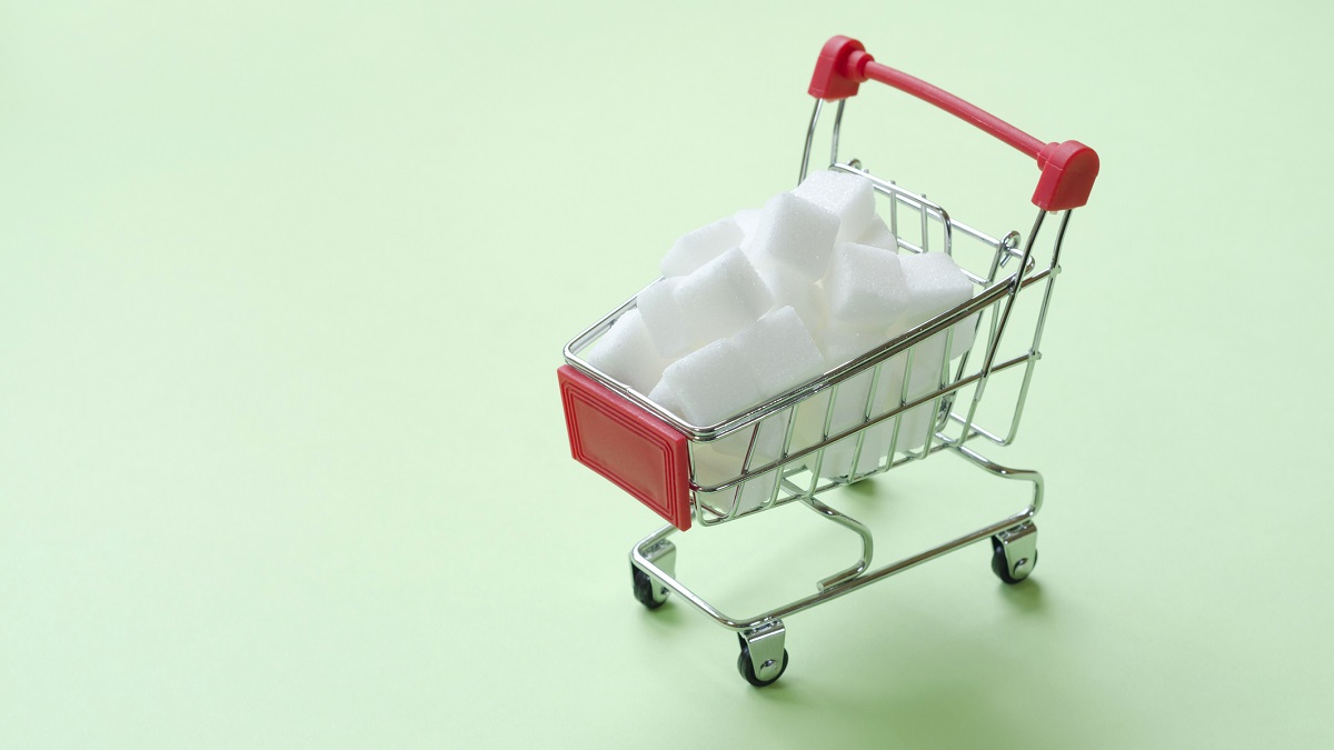 Photo of sugar cubes in a toy shopping trolley