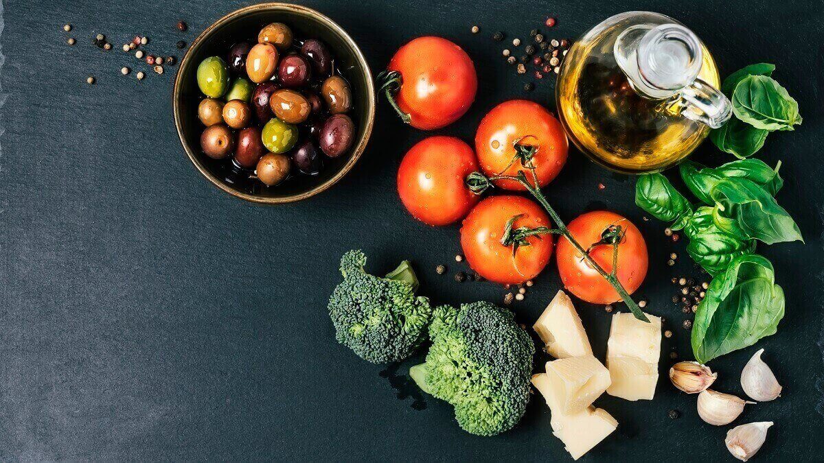 Tomatoes, olives, brocolli, oil, basil, cheese and garlic