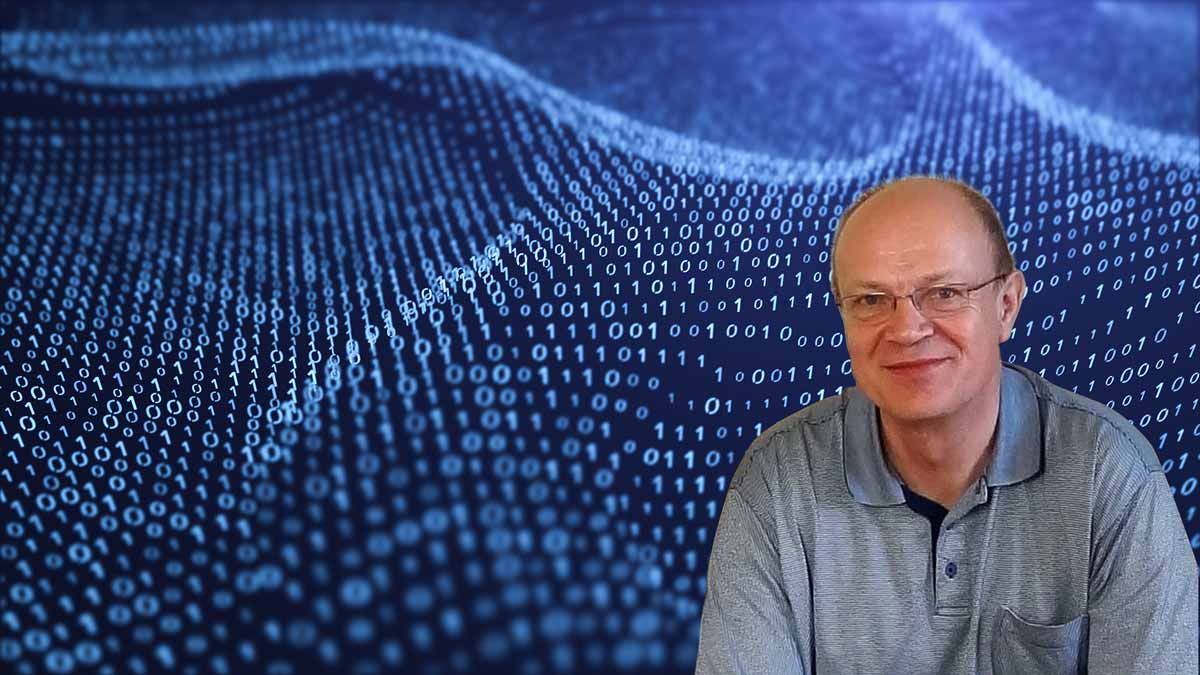 Professor Josef Pieprzyk infront of Abstract of Computer Language
