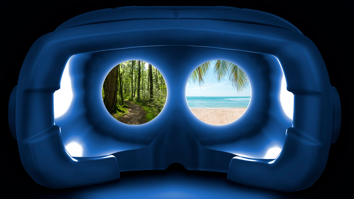 A view throught binoculars showing a beach and a rainforest