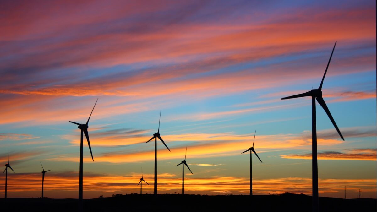 Wind turbines against the sunrise