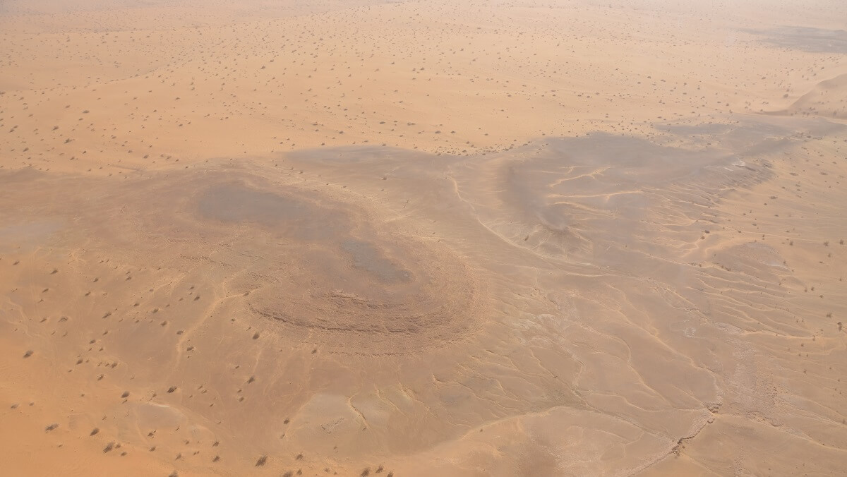 A wide aerial shot of a desert