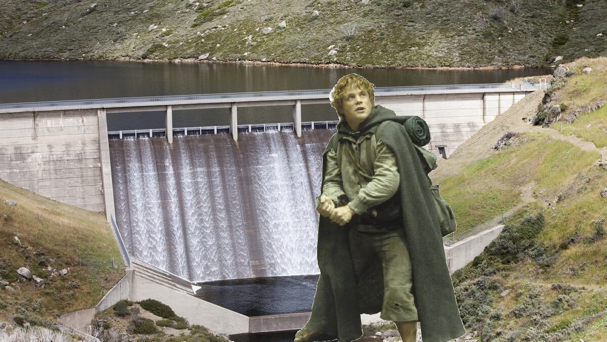 a hobbit infront of a dam