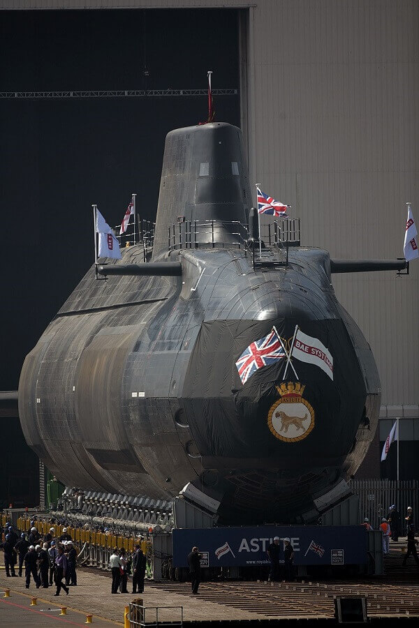 Nuclear submarine on the ground being launched outside shipyard