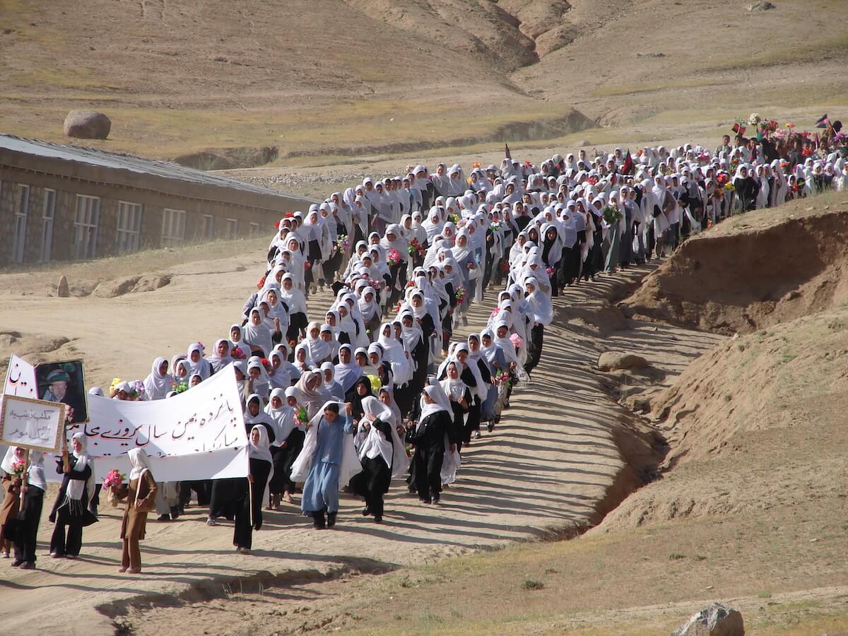 girls marching to school in Afghanistan