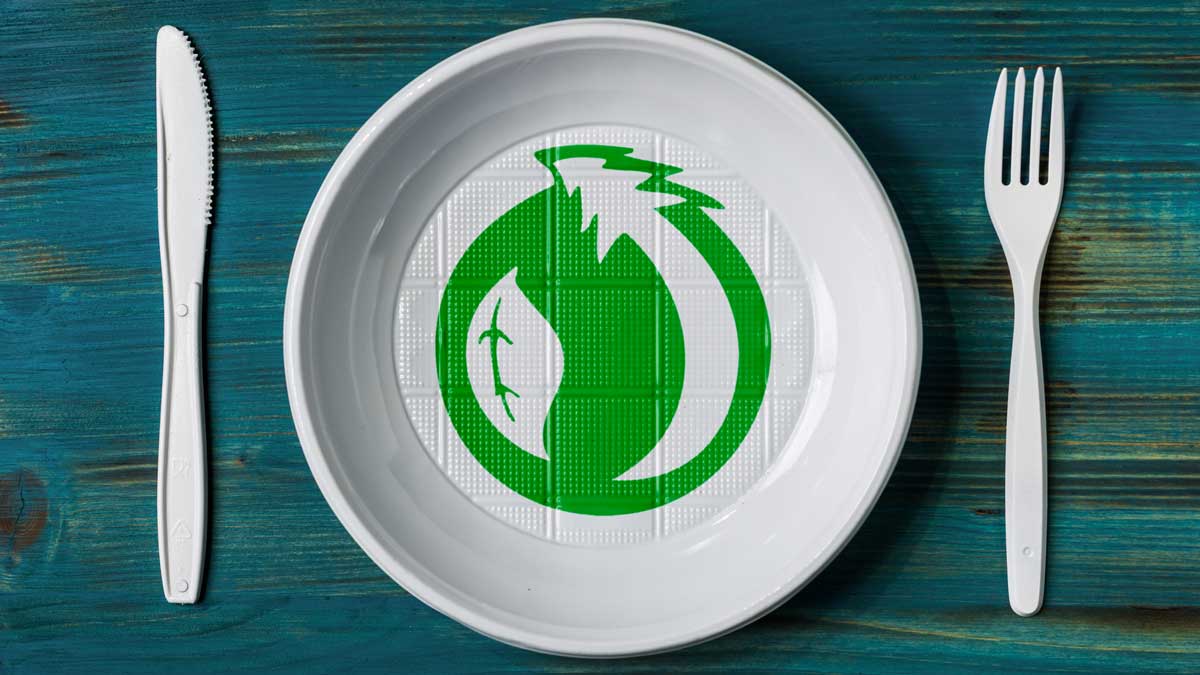plastic plate knife and fork with a recycle logo