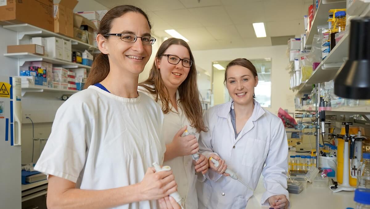 Three women in a science laboratory