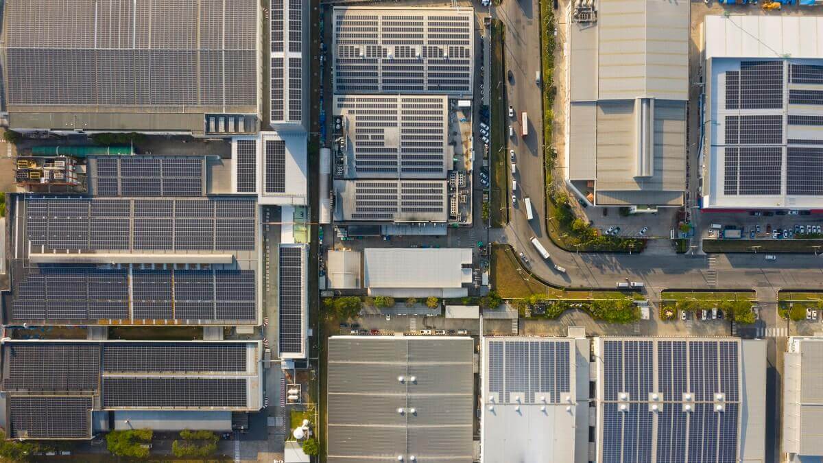 aerial image of rooftop solar panels and batteries