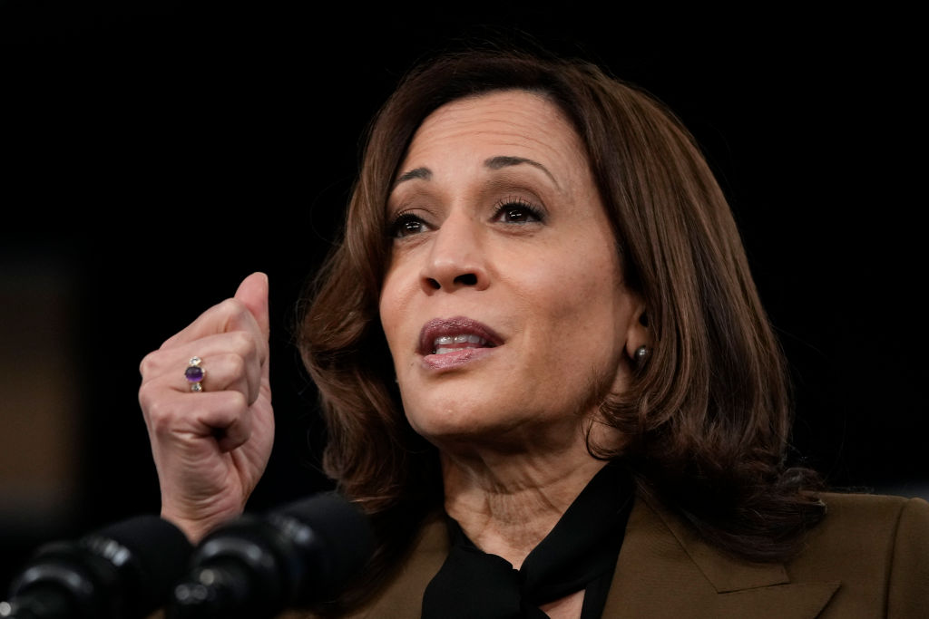 Close up of woman giving speech - kamala harris, who recently spoke out about bluetooth headphone hacking