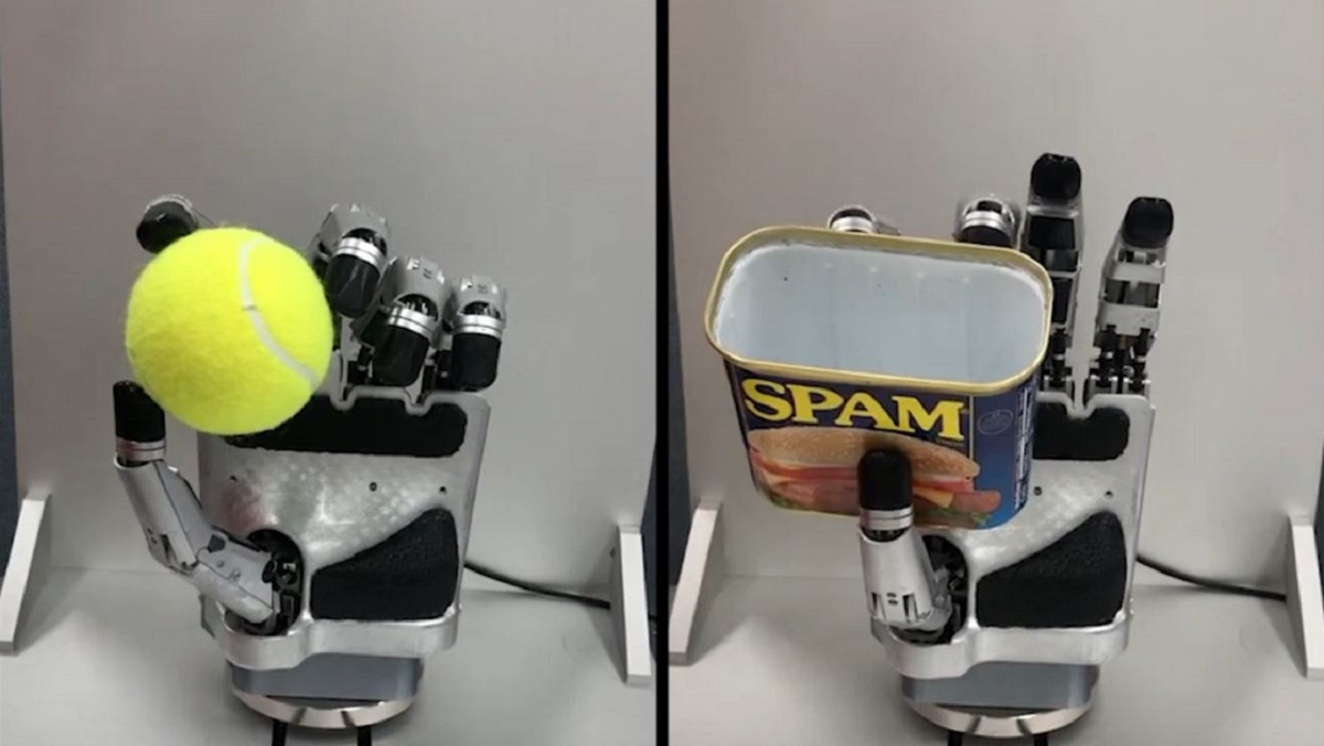 Robotic hand holding a tennis ball and a tin