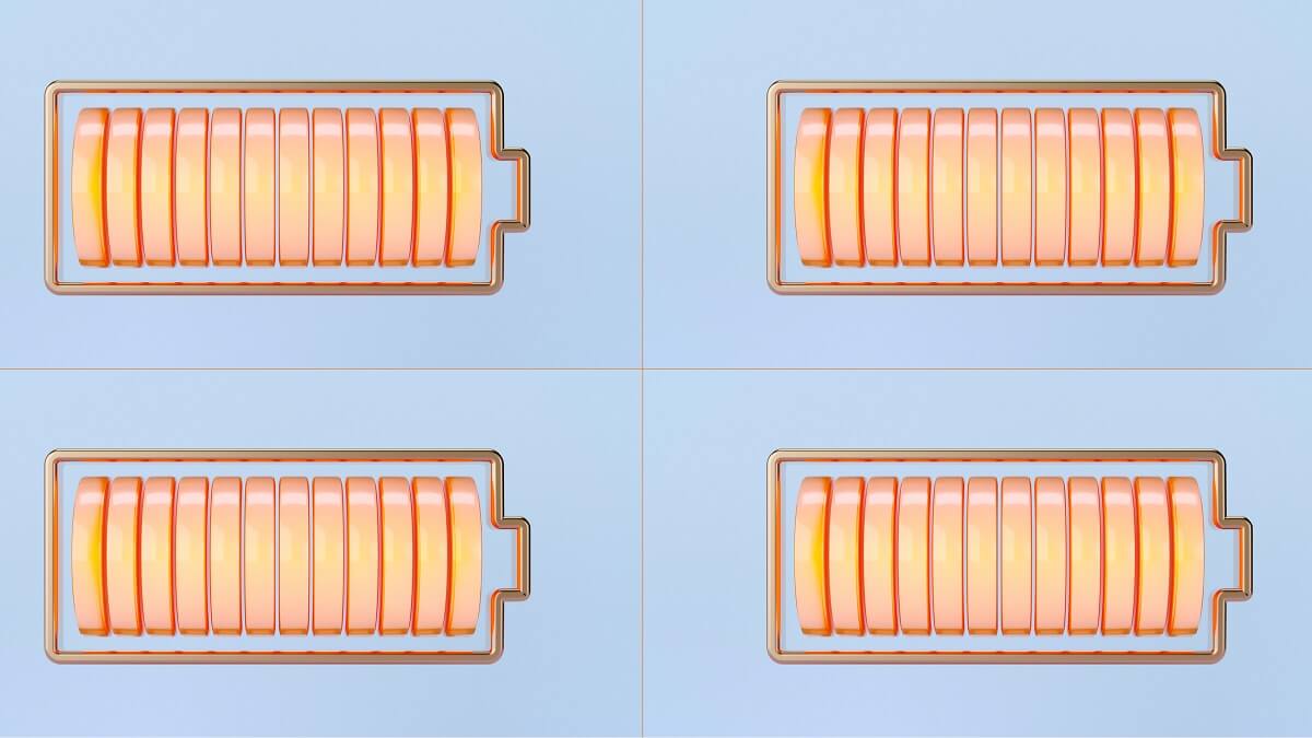four orange 3d computer images of batteries