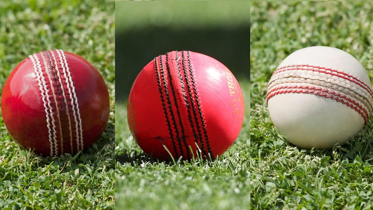red, pick, and white cricket balls on turf