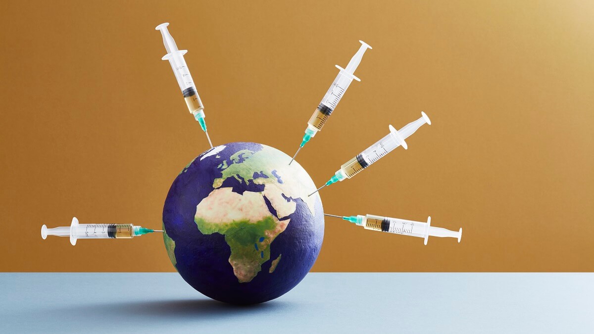 Five syringes pierce the planet Earth,