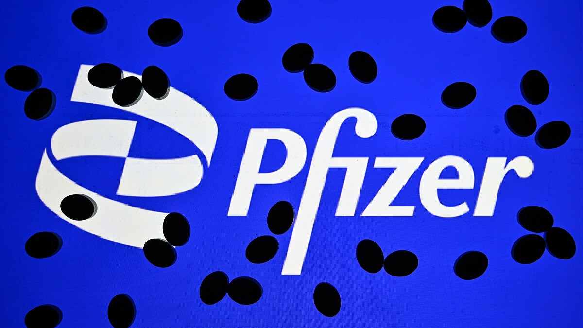 pills on top of pfizer logo