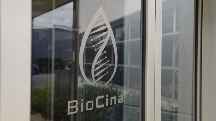 Sliding doors with biocina logo on them