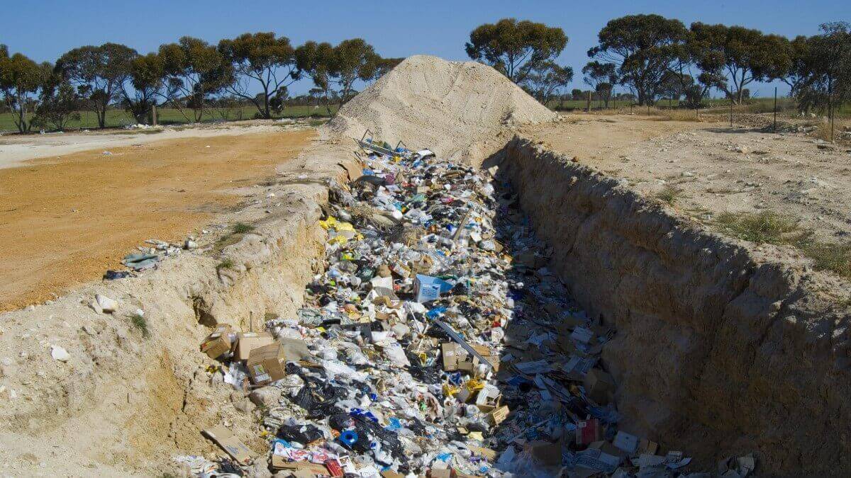 plastics in a trench in australian bush