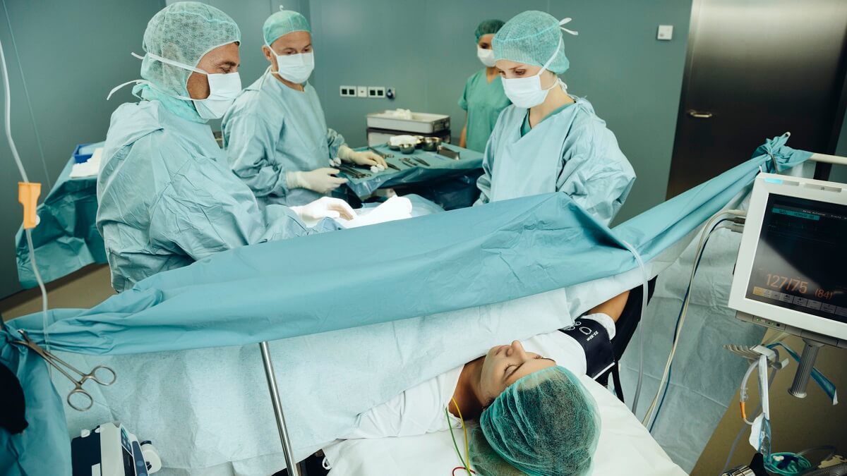 Woman undergoing surgery for breech baby.