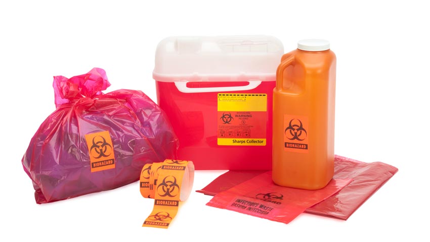 Photo of different hazardous waste containers and stickers